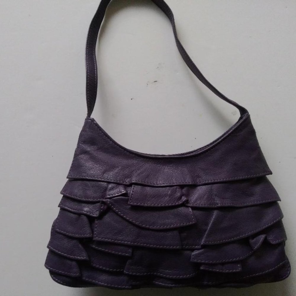 Purple leather handbag
